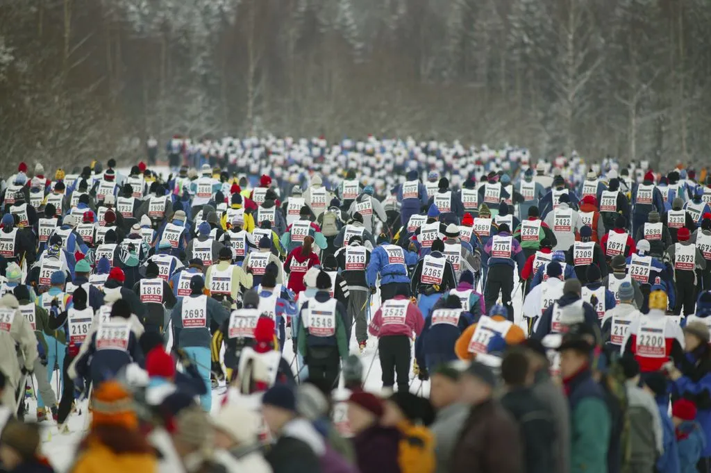 Tartu Maraton skiers on snowy forest trail during Estonia’s biggest cross-country skiing event.