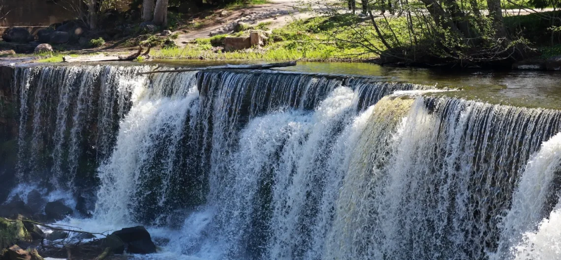 Keila waterfall near Tallinn, Estonia with powerful cascading water in spring