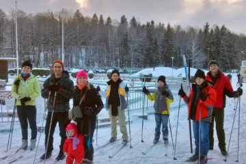 Family and children learning cross-country skiing in Tallinn