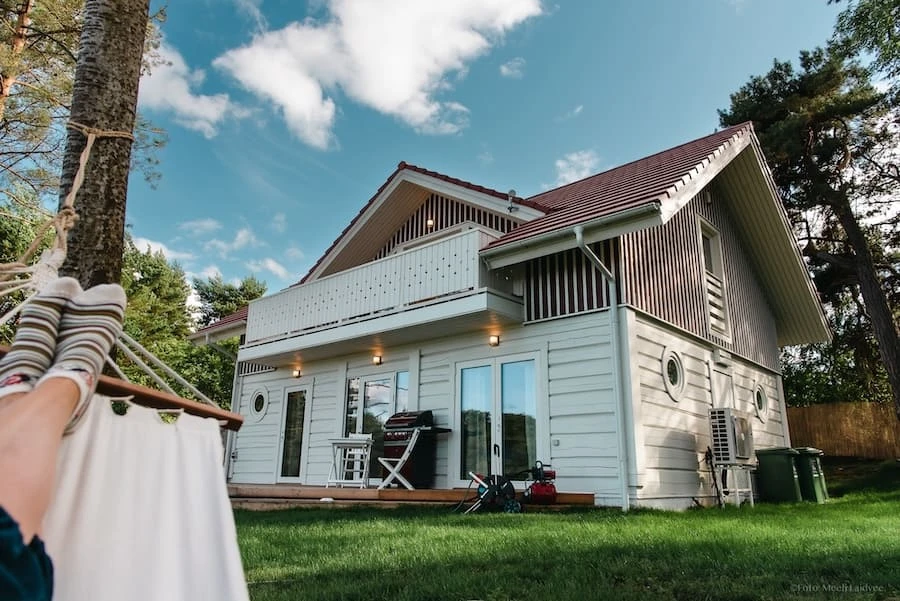 Exterior of Villa of Nature Energy on Prangli Island with hammock, terrace and outdoor BBQ area